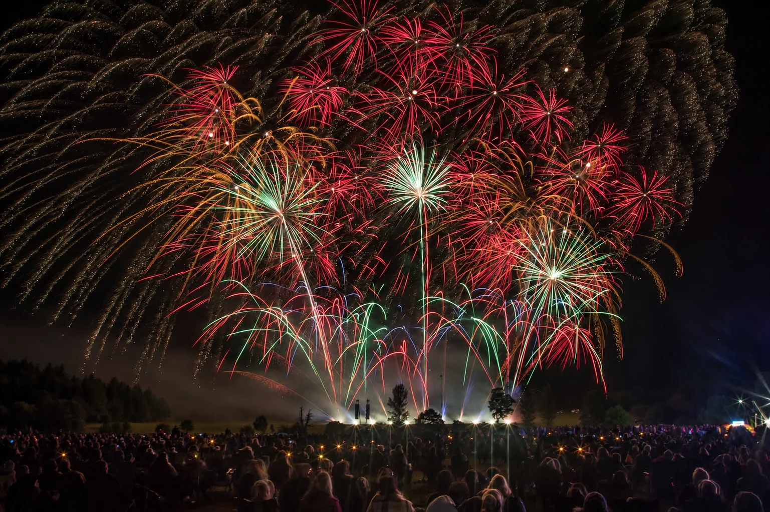 Fireworks bursting in colour above the display arena